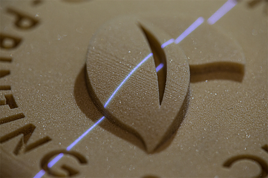 Testing printed components with blue laser sensors